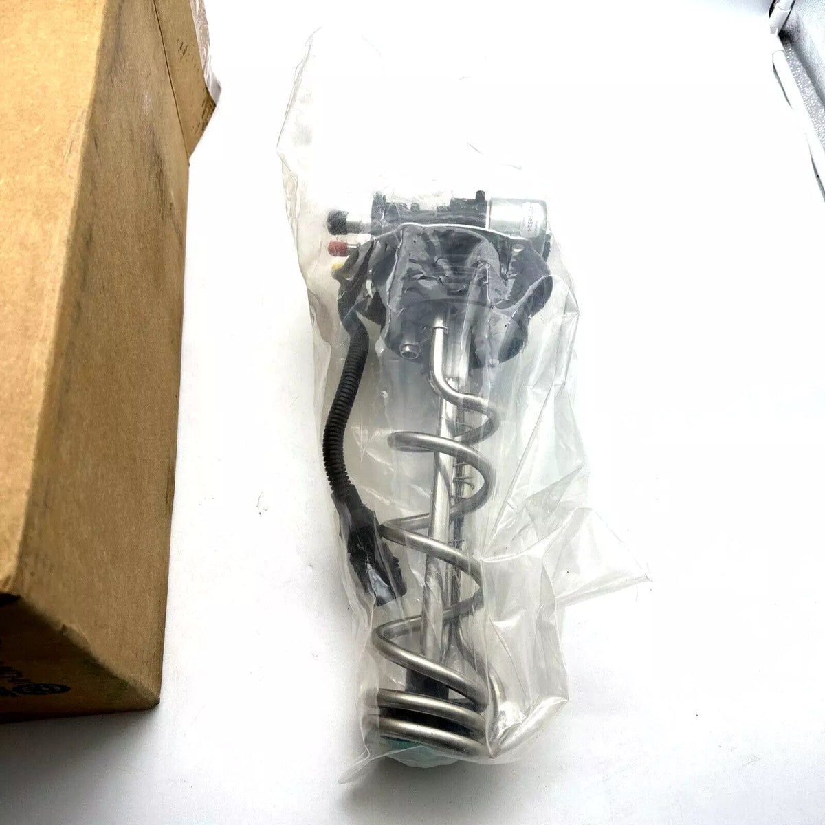 RE569648 | Genuine John Deere DEF Tank Header Assembly